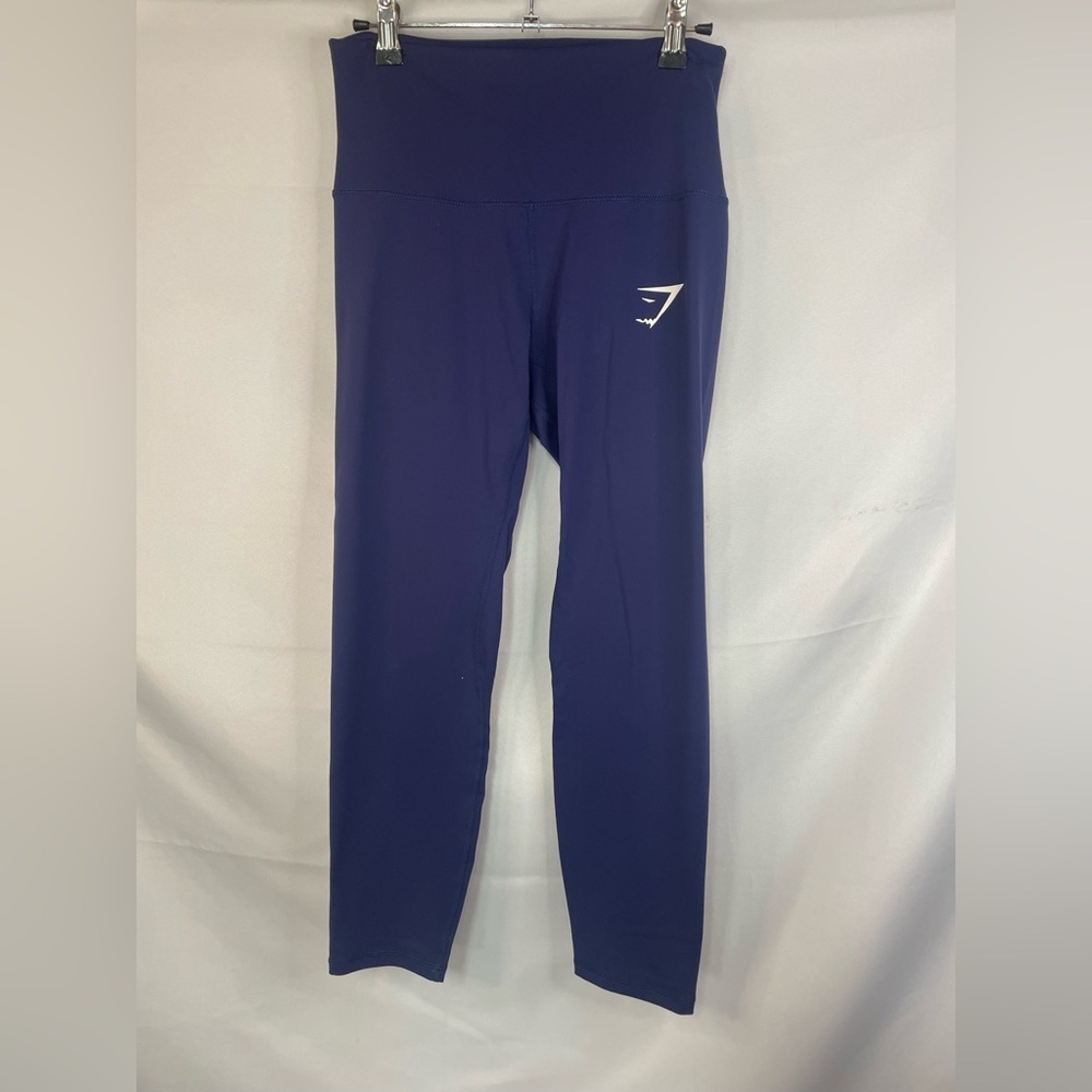 Gymshark purple/gray leggings with a wide waist band and are buttery soft.